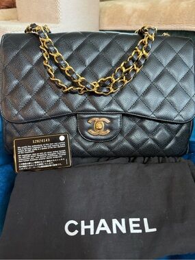 CHANEL series 12 black caviar single flap jumbo